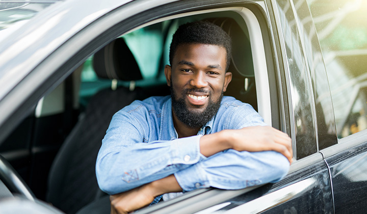 Photo of Man in Car